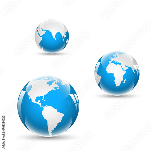 Three realistic globes representing planet Earth with continents and oceans.