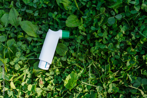 Pocket inhaler Outside in summer, allergy and asthma concept