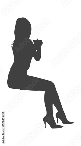 Silhouette Serenity: An elegant silhouette of a seated woman, highlighting grace and poised posture, inviting viewers to admire the subtle artistry.