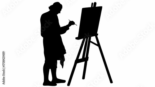 Silhouette of an artist standing in front of an easel and painting on a canvas with a paintbrush tool