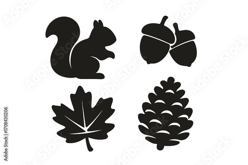 Set of autumn forest icons. Black silhouettes of squirrel, acorn, maple leaf, and pinecone. Vector graphic elements for fall season design. Woodland animal and plant symbols.