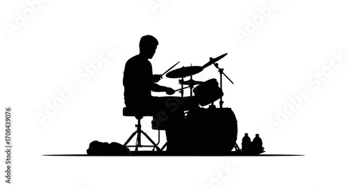Dynamic drummer silhouetted playing a full drum kit with energy and passion on white background
