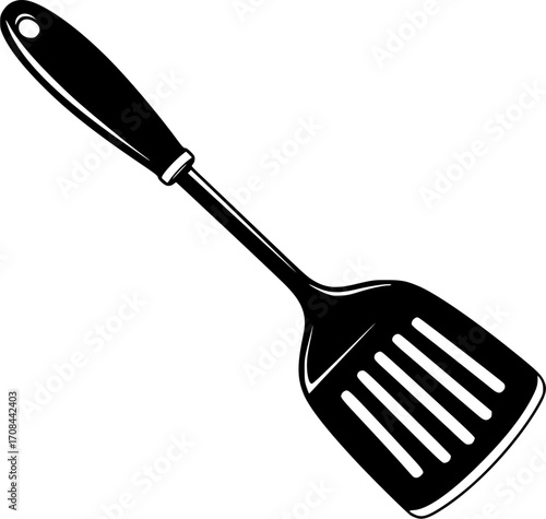 A sleek black spatula with ventilation slots and a hanging hole on a white backdrop