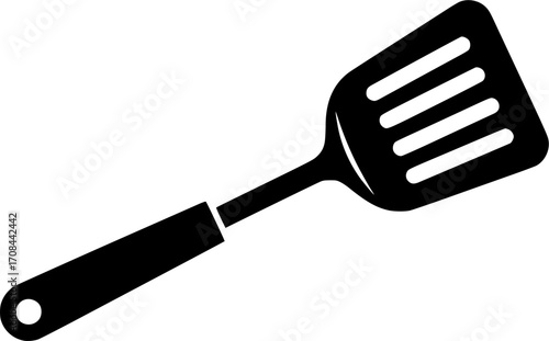 A sleek black spatula with ventilation slots and a hanging hole on a white backdrop