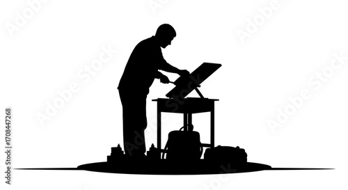 Artist silhouette creating masterpiece on easel with art supplies around, inspiring creativity