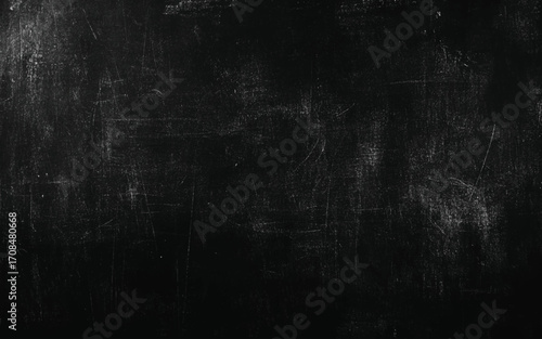Chalk rubbed out on blackboard background. 