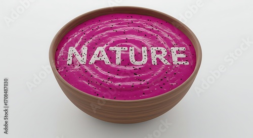 Vibrant pink dragon fruit smoothie bowl with 'NATURE' text, a healthy and delicious breakfast concept