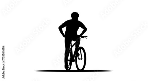 Active cyclist pauses with hands on hips, ready for adventure, enjoying a moment of freedom