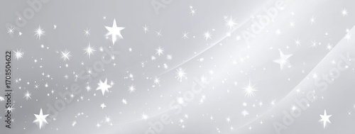 Abstract backdrop of light gray with white stars and sparkles
