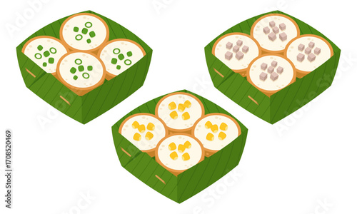 Thai coconut pancakes (khanom krok) served in banana leaf cups with toppings of spring onion, corn, and taro
