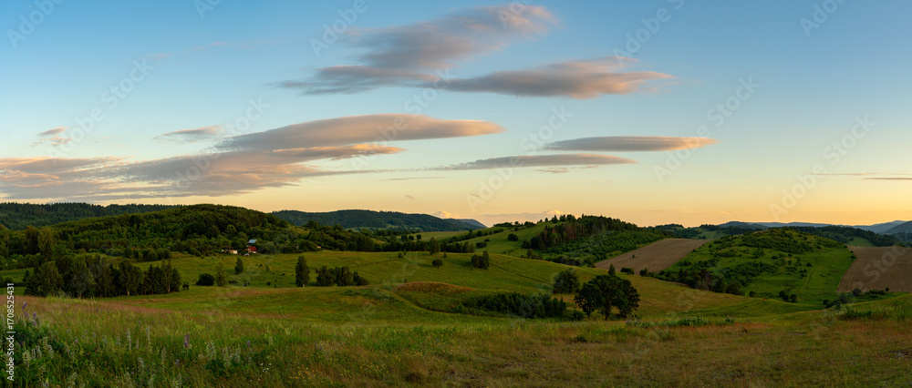 Obraz premium Landscape of the hills on the outskirts of Kamienna Góra during beautiful sunset on a summer afternoon, Lower Silesia, Poland.