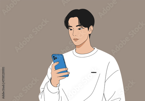 A young man with black hair is looking at his blue smartphone, wearing a white sweatshirt, showcasing modern communication and technology in a casual setting