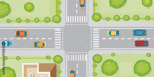 Aerial view of a stylized city intersection with cars and trees in a flat design style