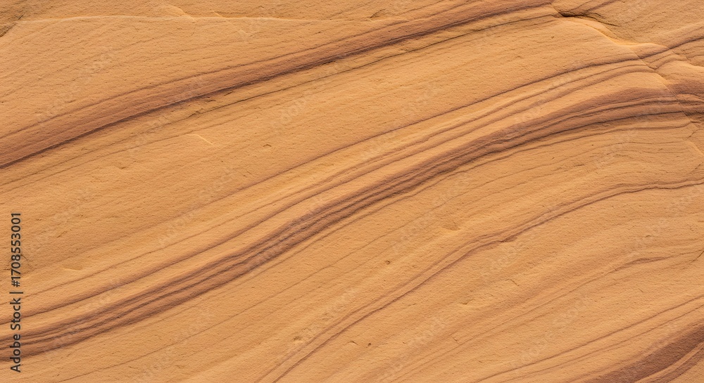 Fototapeta premium Intricate Texture of Sandstone Rock Formation: Natural Swirls and Layers of Sedimentary Stone