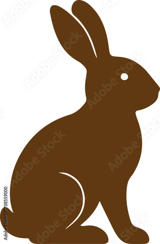 Simple brown silhouette of a rabbit sitting upright