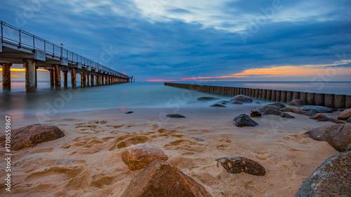 Fototapeta Naklejka Na Ścianę i Meble -  Pier in the evening after sunset in the Baltic Sea 