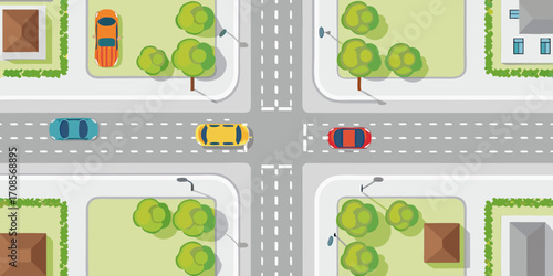 Aerial view of a city intersection with cars and buildings in a flat design style