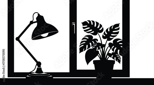 Black silhouette of a desk lamp and a potted monstera plant on a windowsill potted plant