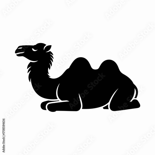 Black silhouette of a dromedary camel lying down
