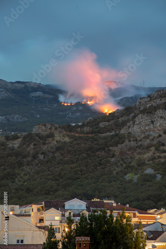 Wildfire above Budva, Montenegro, August 29, 2025. Flames and smoke rise from the hills before rain extinguished the fire overnight.