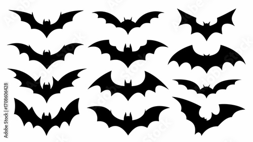 Spooky silhouettes of bats flying for Halloween night designs and creative projects with vector origin