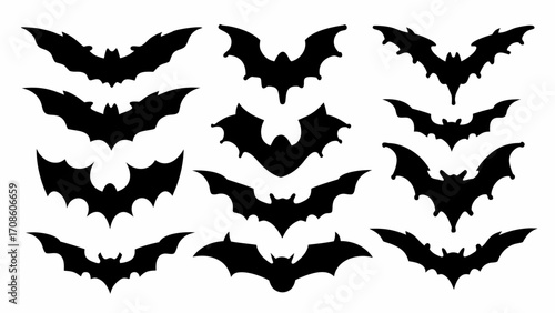 Spooky silhouettes of flying bats perfect for Halloween decorations, vector set for festive designs