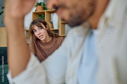 Photos Young woman expressing frustrations about her husband during a couple therapy se