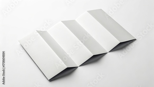 Abstract geometric pattern of folded white paper on a white background