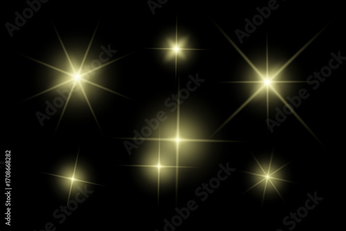 Golden sparkle lights, flashing lights, light effects, sunlight lens flare, glowing ray beams, sparkling starsicon on black background.