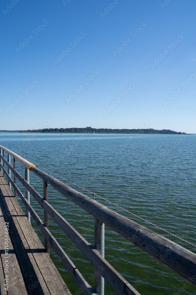 Naklejka premium View from the pier of the lake 