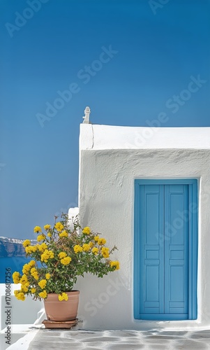 Bright Blue Door With Yellow Flowers Against White Wall in Santorini Under Cl...
