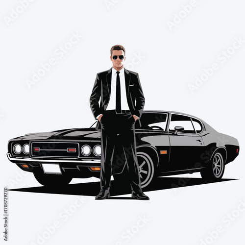 Man in black suit and sunglasses standing in front of a black vintage muscle car white shirt