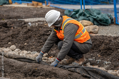 Landscaping Worker on a Construction Site