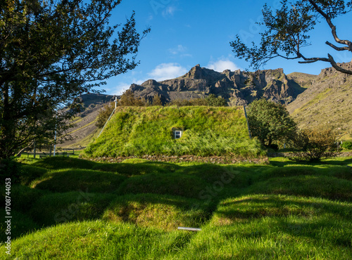 Green roof of traditional turf church in Hof, Iceland