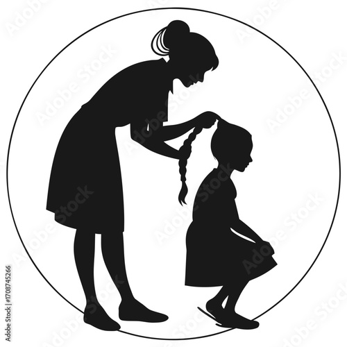 Woman braiding child’s hair