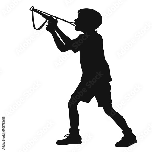 Boy standing with slingshot