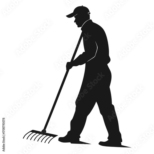 Man standing with plough