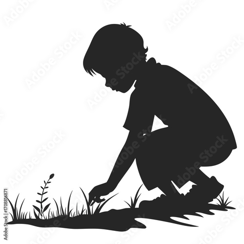 Child squatting near ground