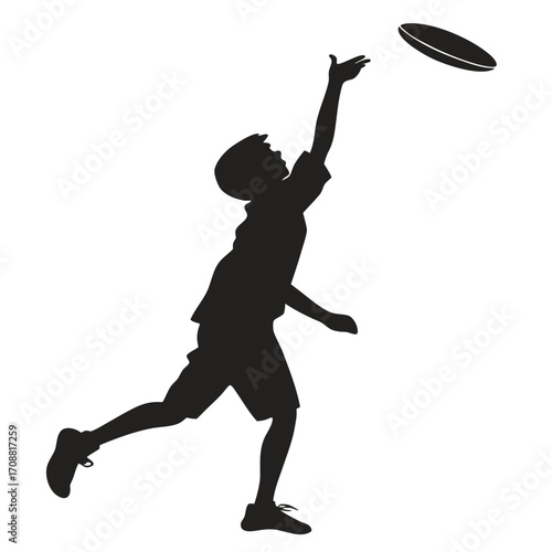 Boy tossing frisbee upward