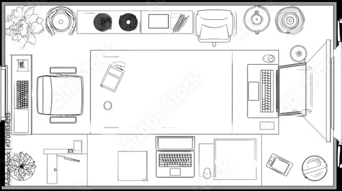 Top view of a modern office desk setup with computer and accessories.