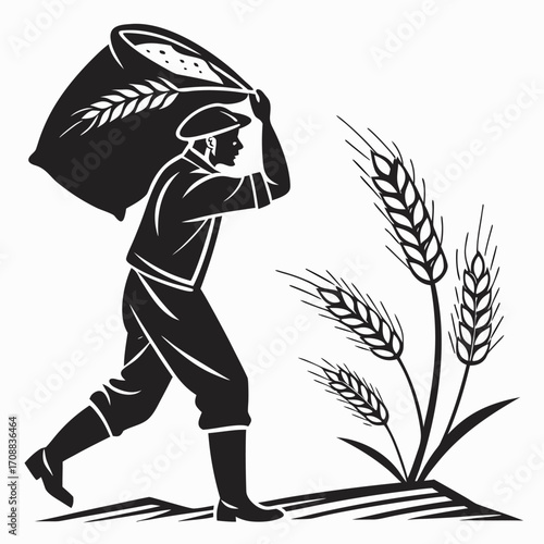 Man lifting sack of wheat