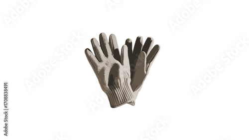 Pair of beige gloves laying on a surface.
