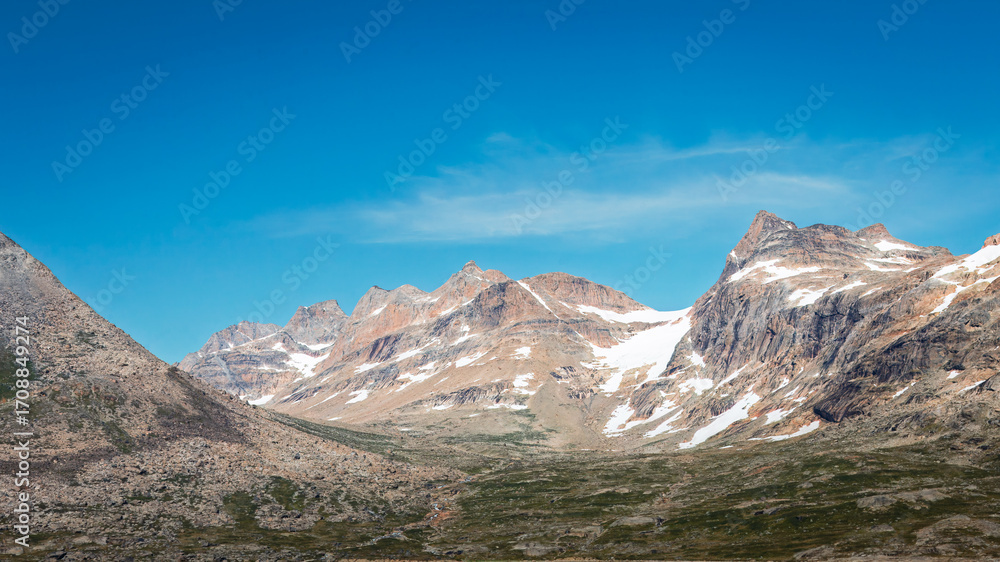 Obraz premium Blue Skies, Glaciers, mountains and Icebergs of Prins Christian Sund, South Greenland, August 2025