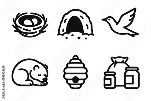 Wildlife and nature silhouette icon set. featuring nest, cave, bird, bear, beehive, and honey symbols