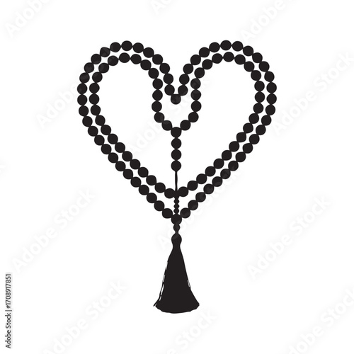 Symbolic heart shape formed by prayer beads with tassel representing love spirituality and devotion