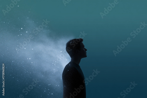 Wallpaper Mural Silhouette of a man surrounded by cosmic elements in a serene setting Torontodigital.ca