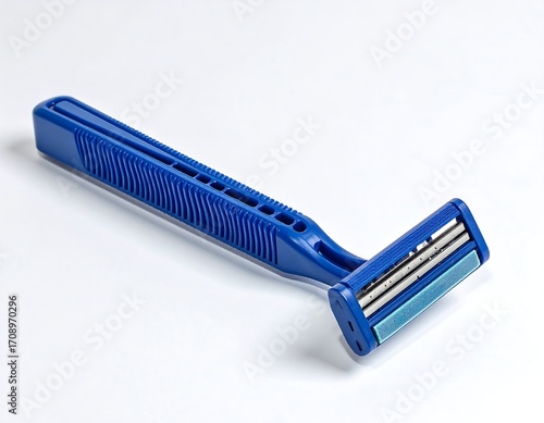 Blue disposable razor on white background