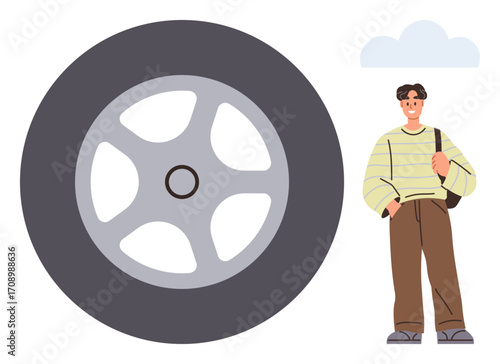 Casual young man with a bag next to a large car wheel symbolizing transportation, innovation, or journey. Ideal for concepts thumbs up travel, progress, mobility, engineering, lifestyle, creativity
