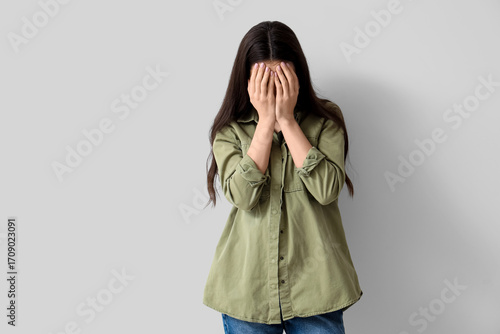 Portrait of worried young w...