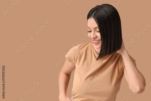 Beautiful young woman with ...